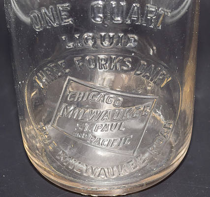 CHICAGO MILWAUKEE ST PAUL & PACIFIC MILK BOTTLE