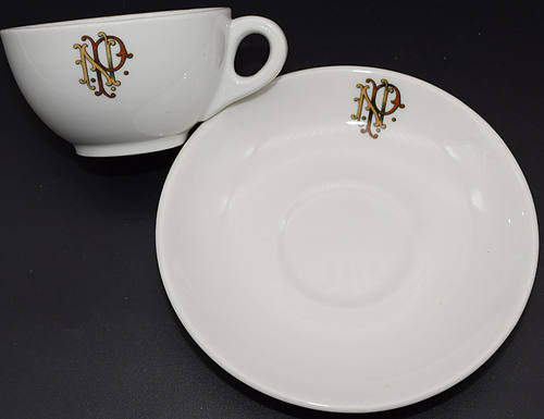 NP STAMPEDE CUP & SAUCER