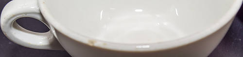 NP STAMPEDE CUP & SAUCER