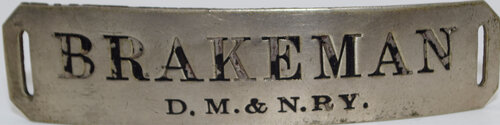 DM&N RY BRAKEMAN BADGE