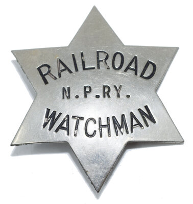 NPRY RAILROAD WATCHMAN BADGE