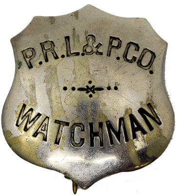 PRL&P CO WATCHMAN BADGE