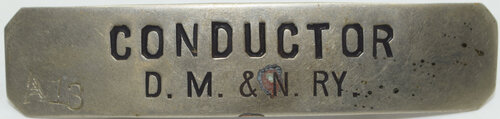 DM&N RY CONDUCTOR BADGE